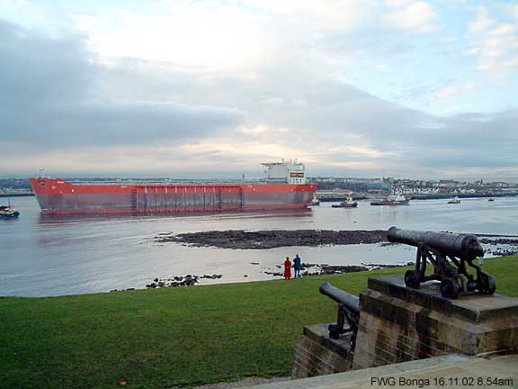 With the cannons approval. The immense oil and gas production platform Bonga, is towed towards the AMEC yard, Wallsend.